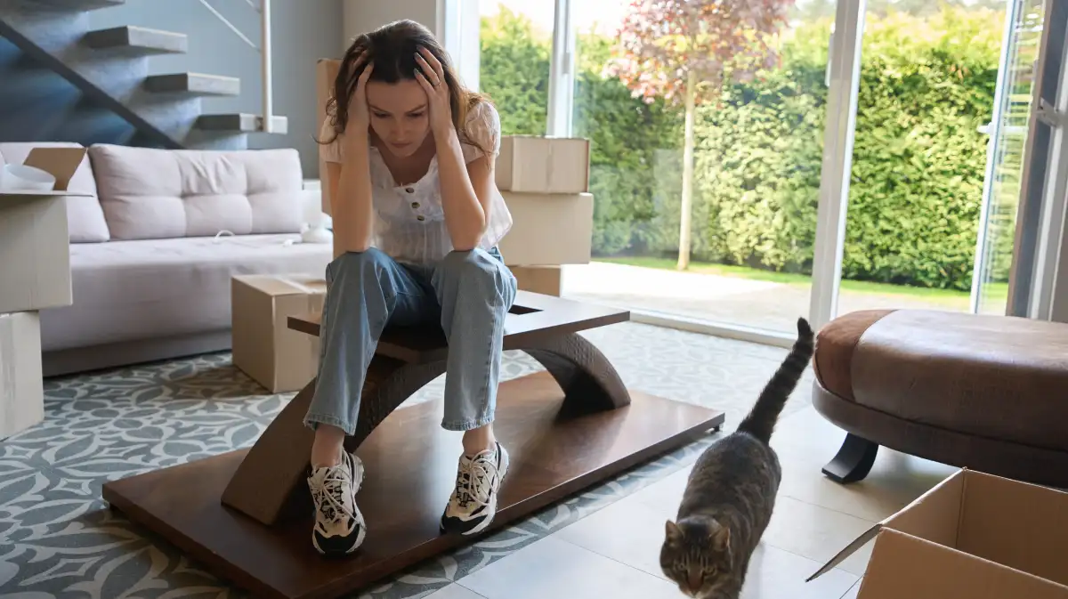 a woman stressed-out because she got scammed by irresponsible real estate agent